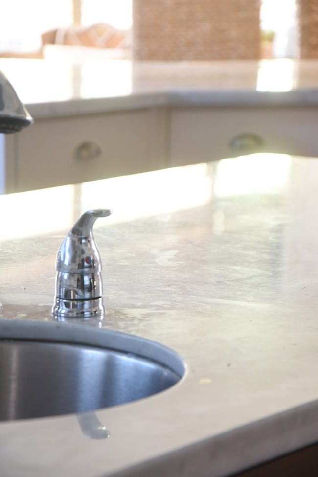 Dull, hazy marble countertop before restoration